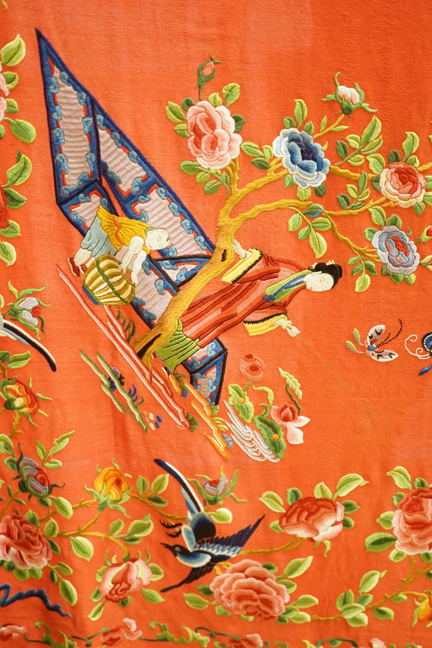 A Chinese early 20th century silk crepe, polychrome embroidered shawl